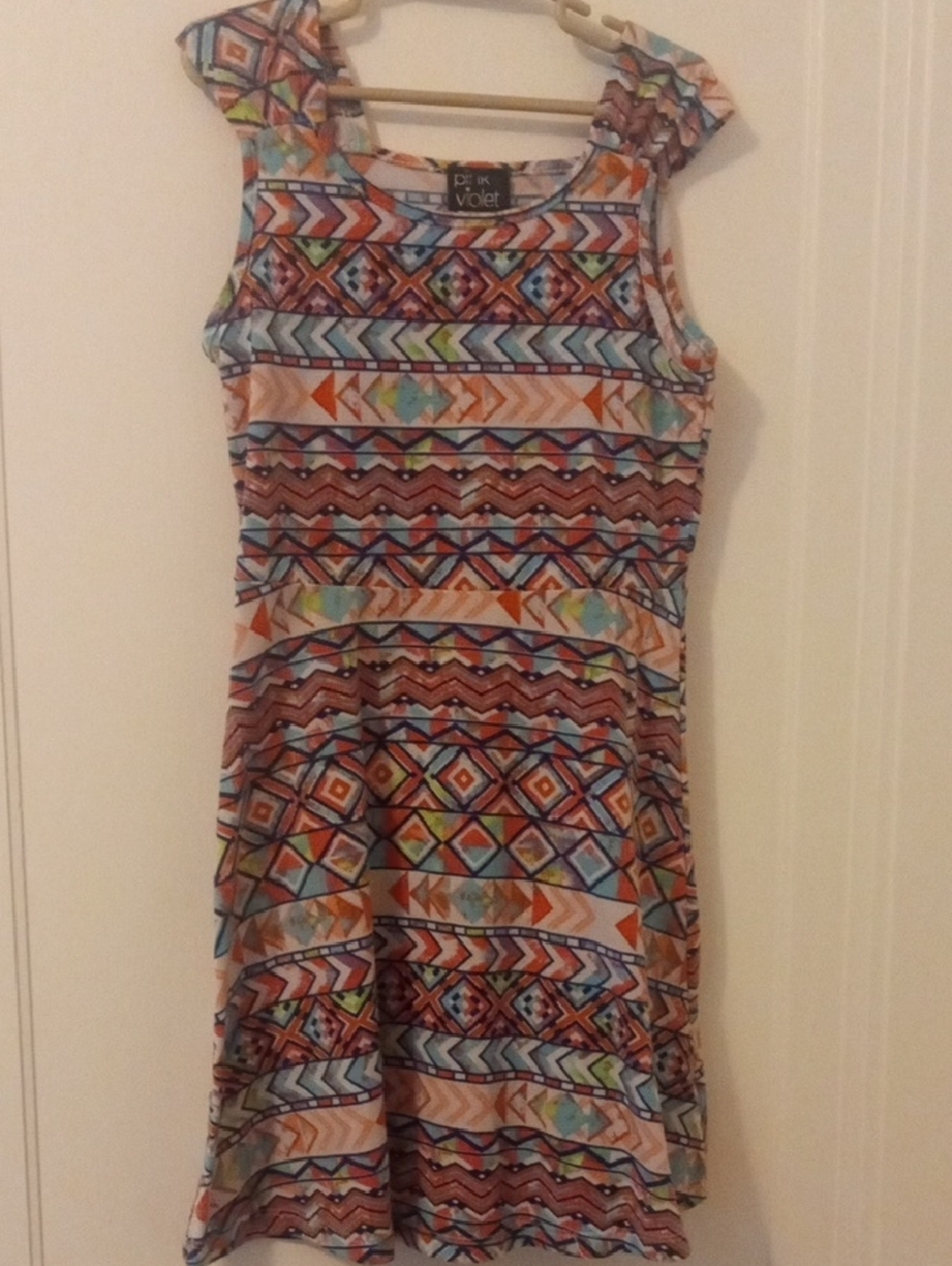 girls med bright colored sundress